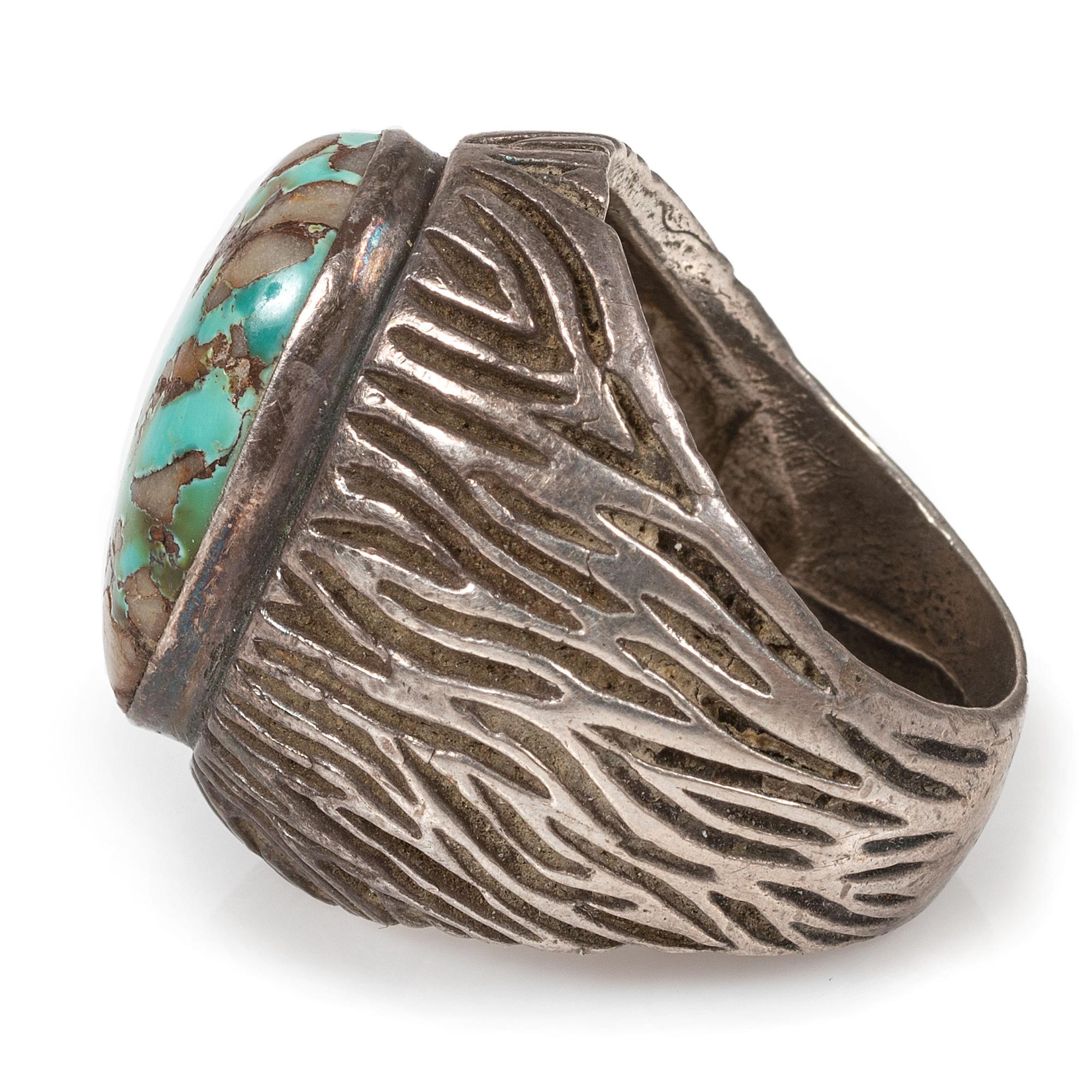 An Assortment of Navajo Silver and Turquoise Rings