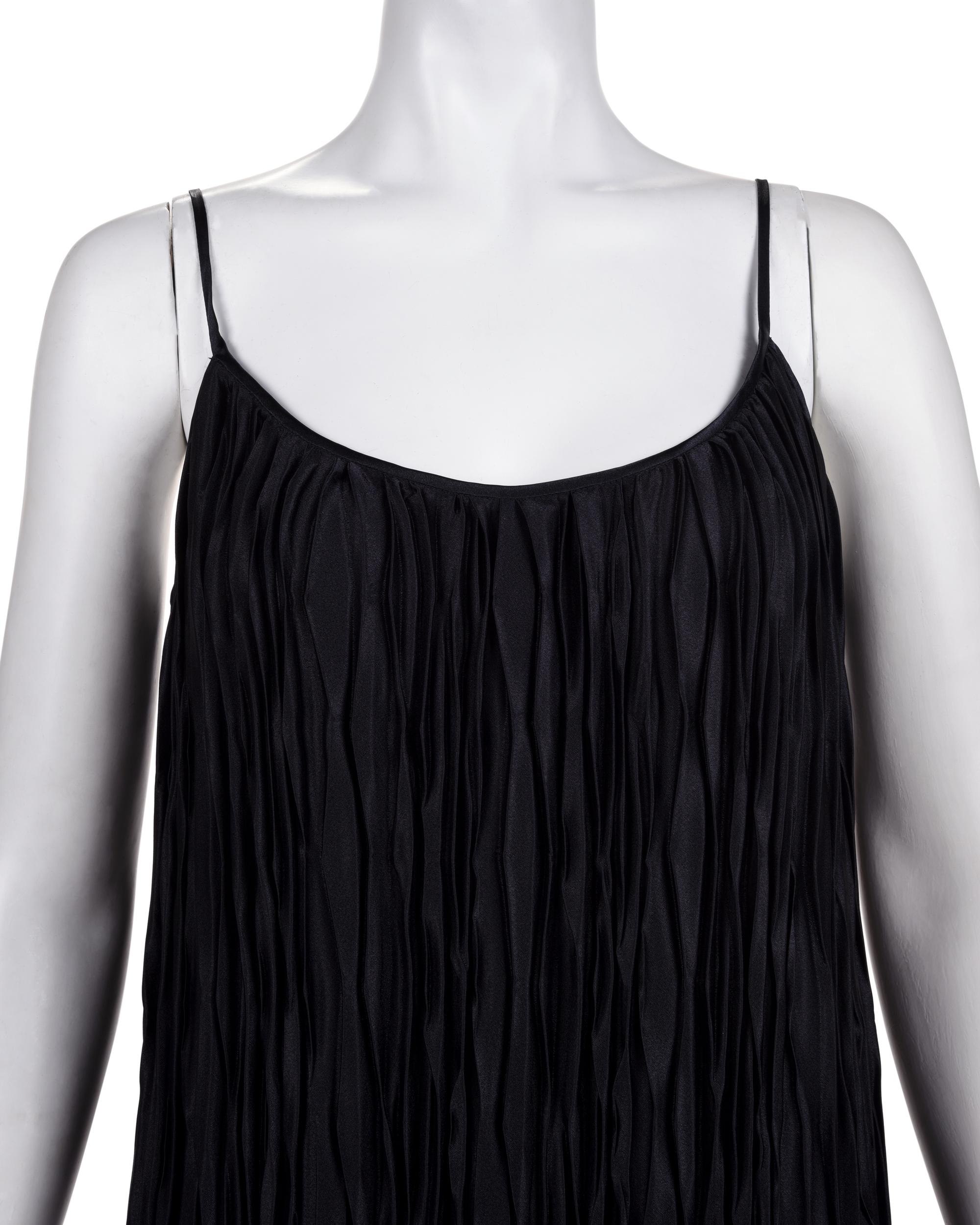 Three Pleated Items: One Zandra Rhodes Bolero and Dress, and One Mary McFadden Dress with Belt, 1980s