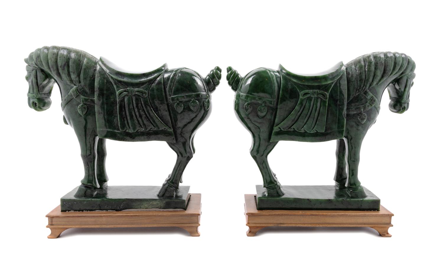 A Pair of Chinese Spinach Jade Models of Horses