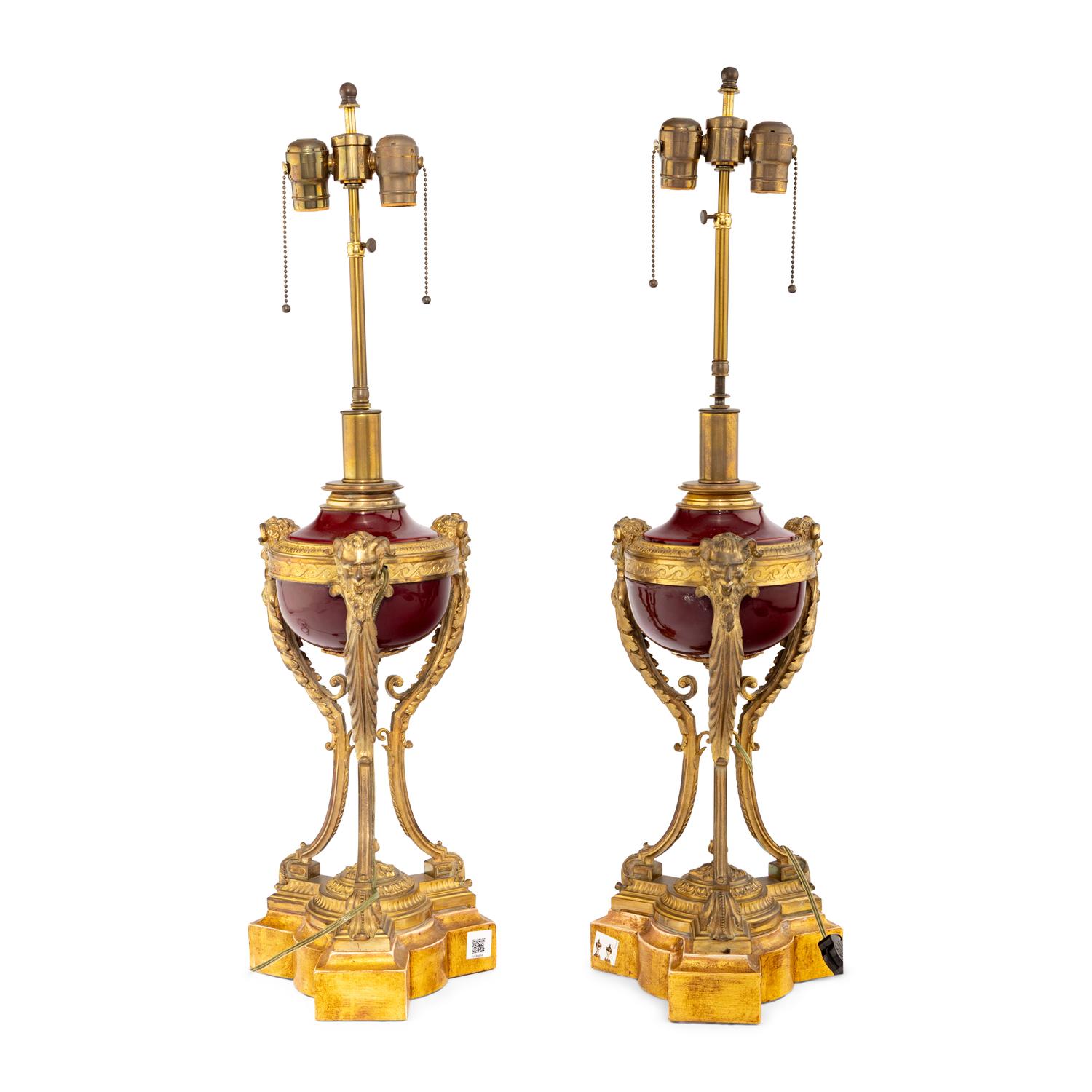 A Pair of Louis XVI Style Gilt Bronze Mounted Porcelain Urns