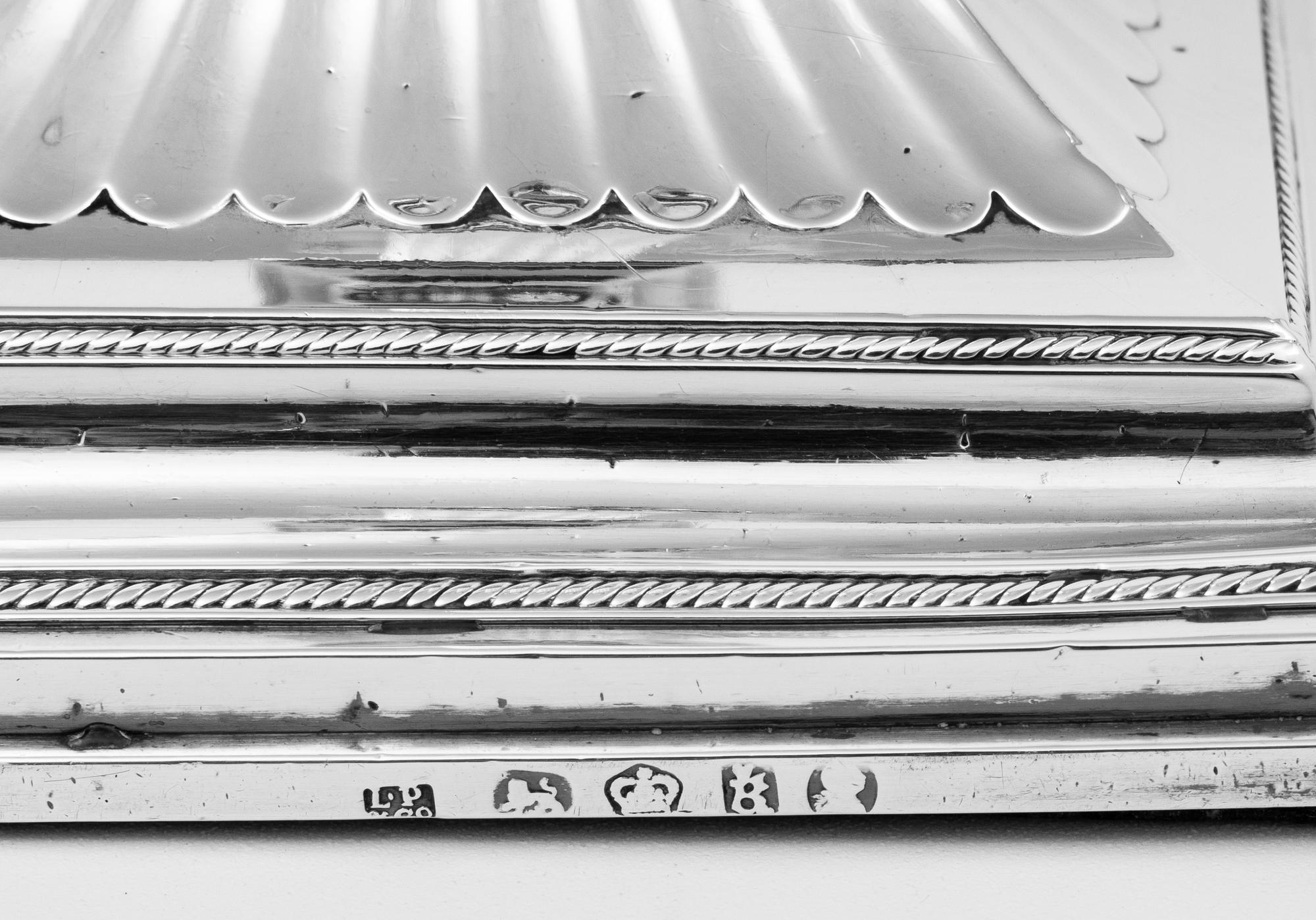 A Pair of English Silver Candlesticks