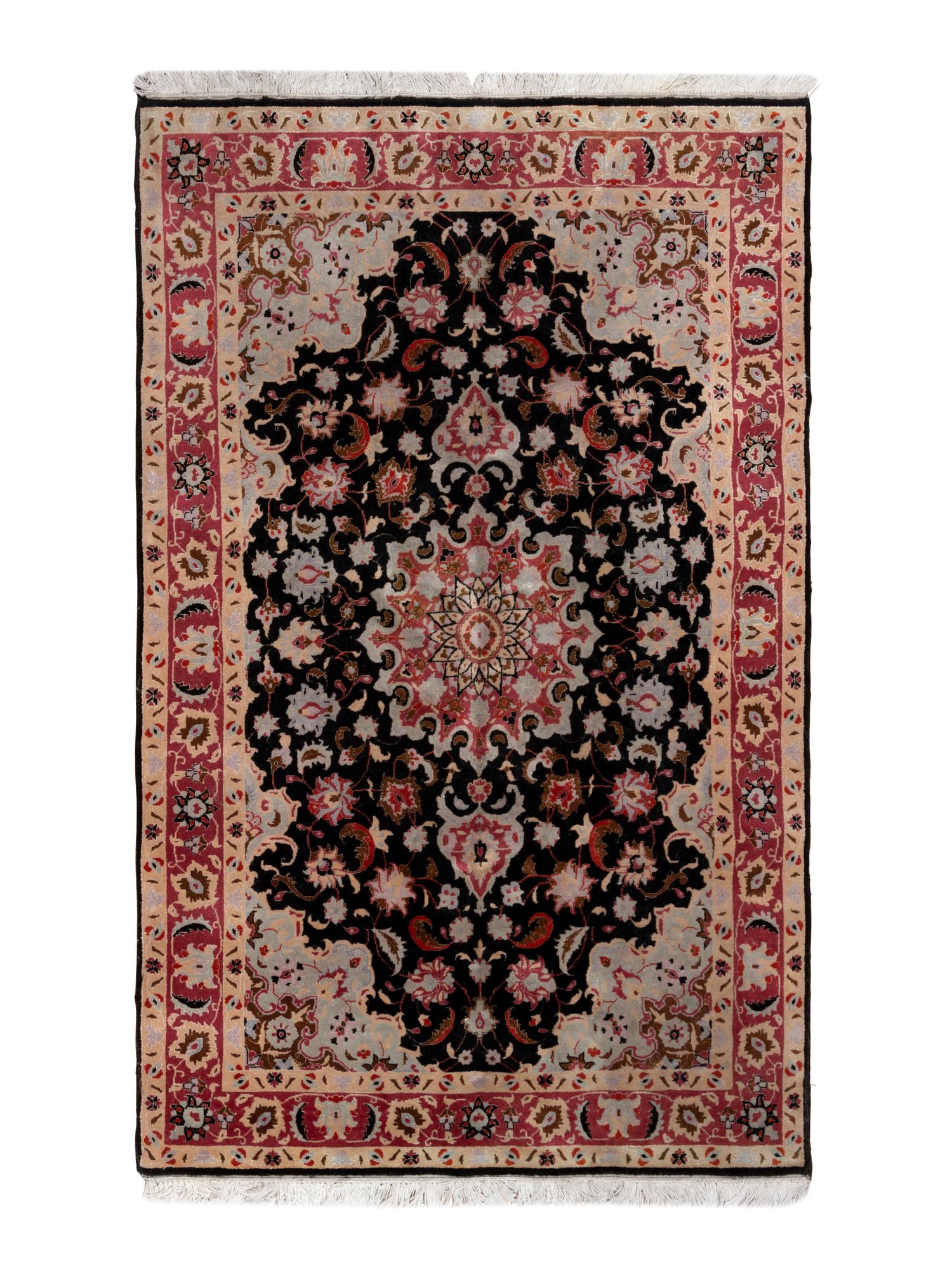 A Tabriz Wool Rug