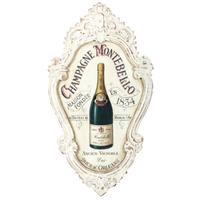 A Champagne Montebello 1884 Hand-Painted and Carved Wood Cartouche-Form Advertising Sign
