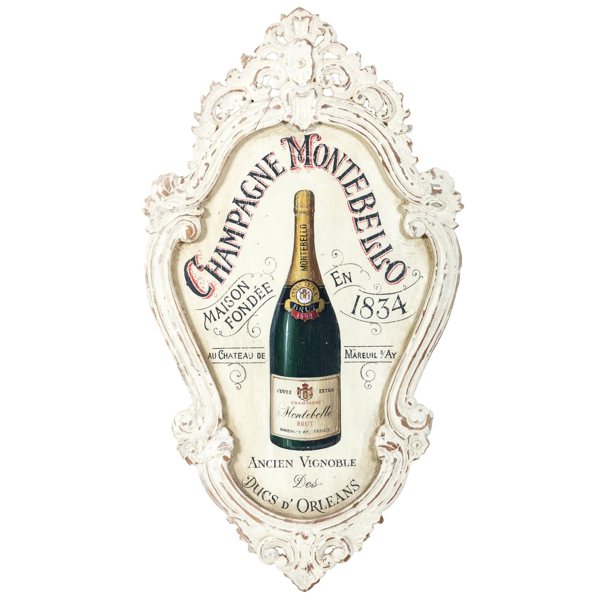 A Champagne Montebello 1884 Hand-Painted and Carved Wood Cartouche-Form Advertising Sign