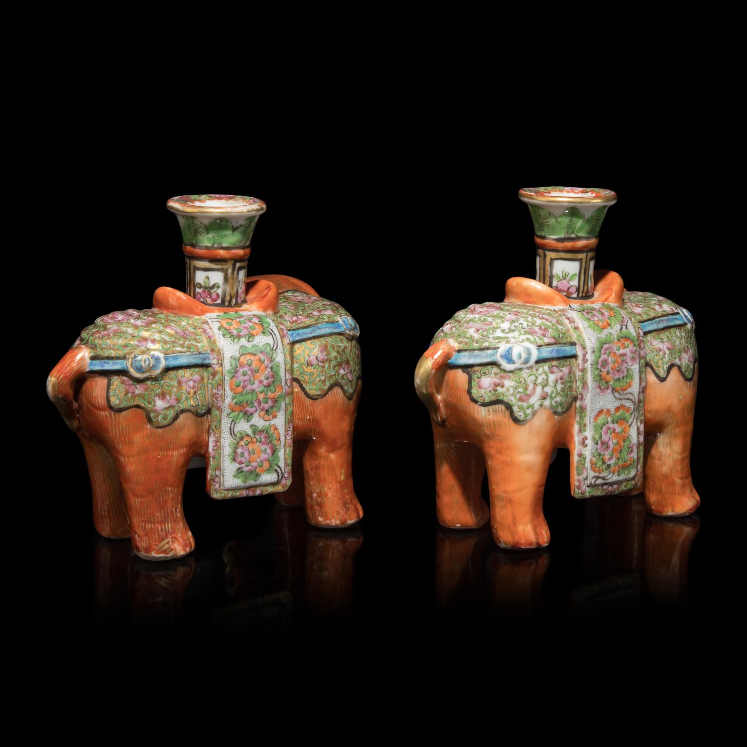 A Pair of Chinese Famille Rose Porcelain Elephant-Form Candle Holders, 19th Century 清晚期 粉彩太平有象燭臺一對
