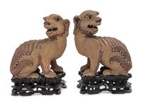 A Pair of Chinese Yixing Zisha Pottery Figures of Fu Lions