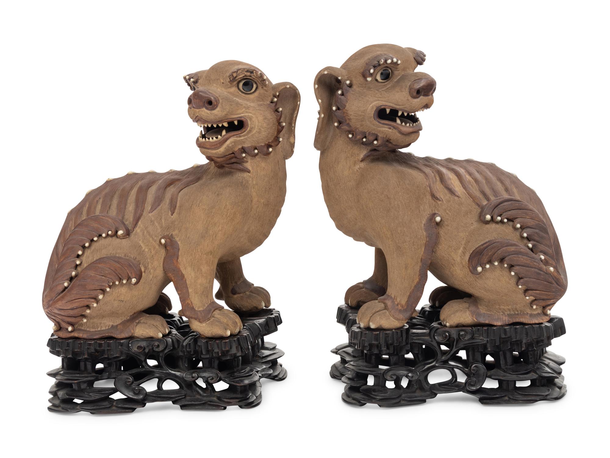 A Pair of Chinese Yixing Zisha Pottery Figures of Fu Lions