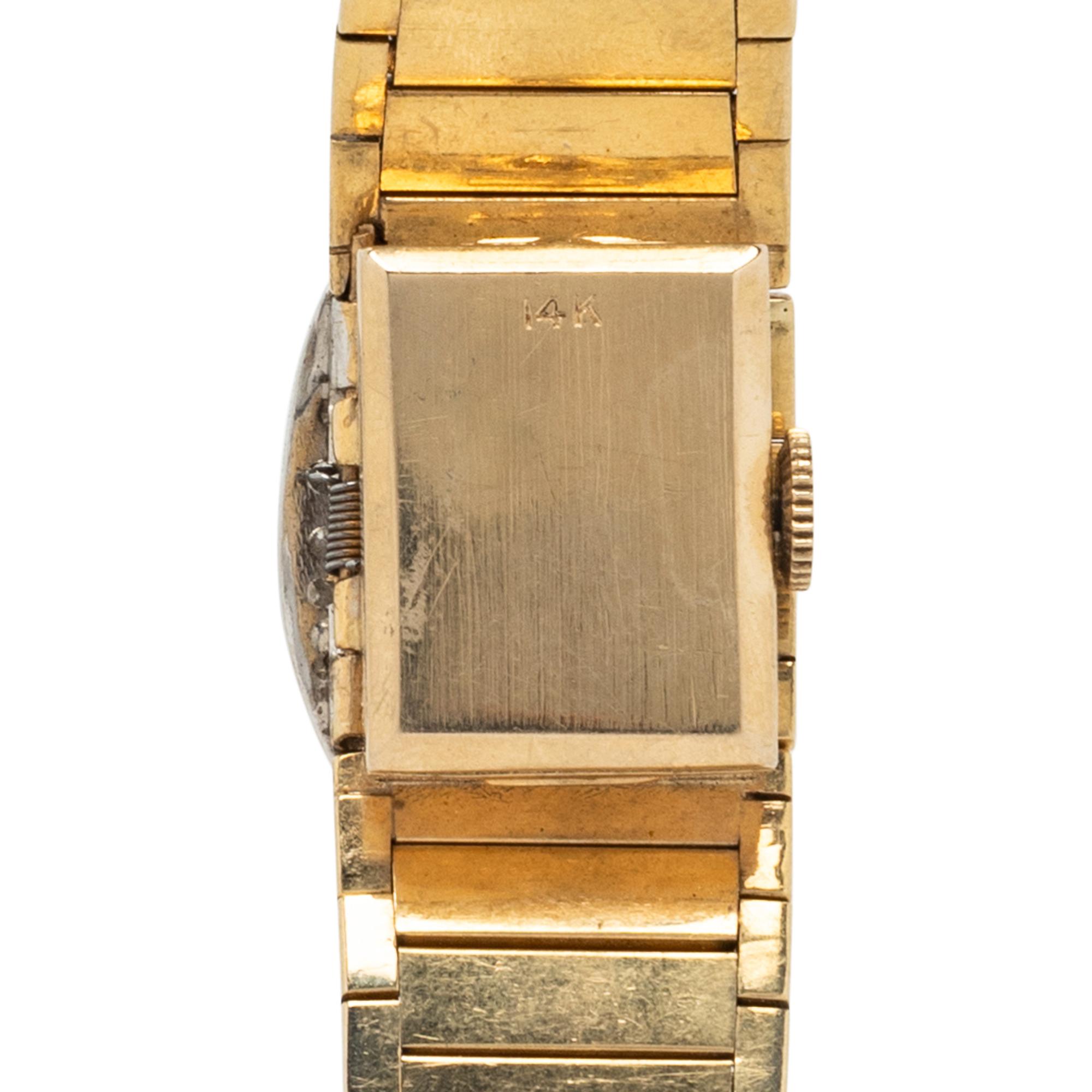 GENEVE, YELLOW GOLD AND DIAMOND SURPRISE WATCH