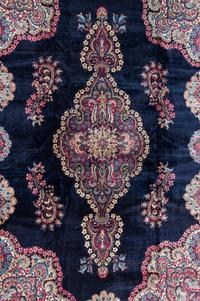 A Kirman Wool Rug