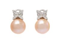 A Pair of 18 Karat White Gold, Cultured Pearl and Diamond Earclips, 5.45 dwts.