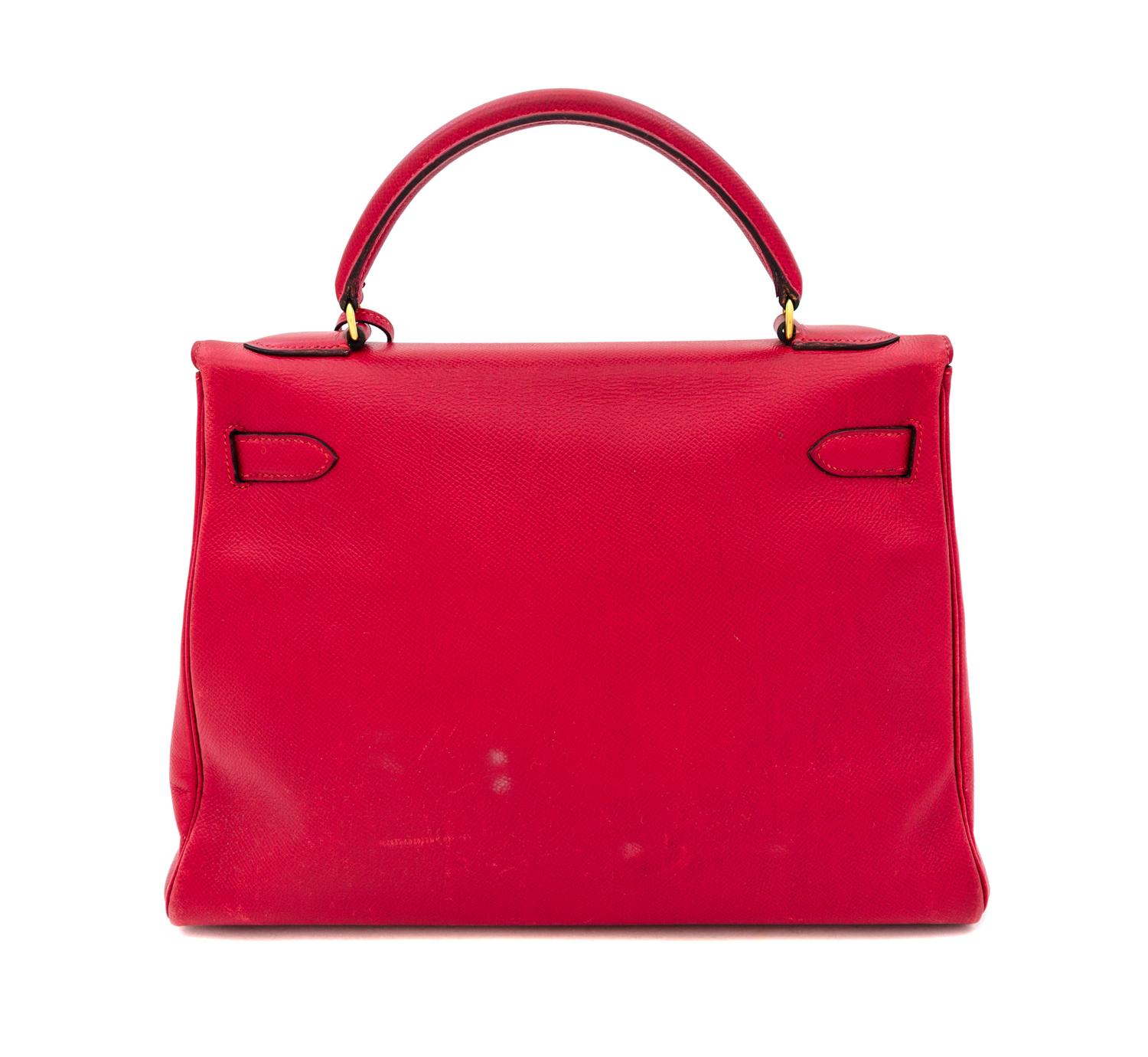 An Hermes Red 32cm Kelly Bag, 12.5" x 9" x 4.5".