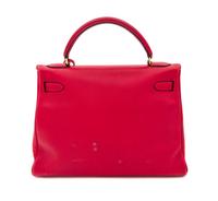 An Hermes Red 32cm Kelly Bag, 12.5" x 9" x 4.5".