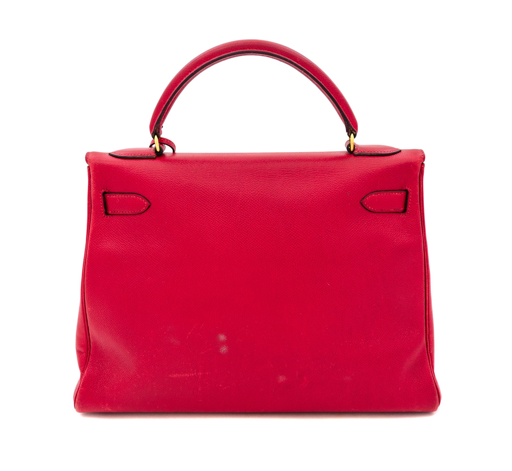 An Hermes Red 32cm Kelly Bag, 12.5" x 9" x 4.5".