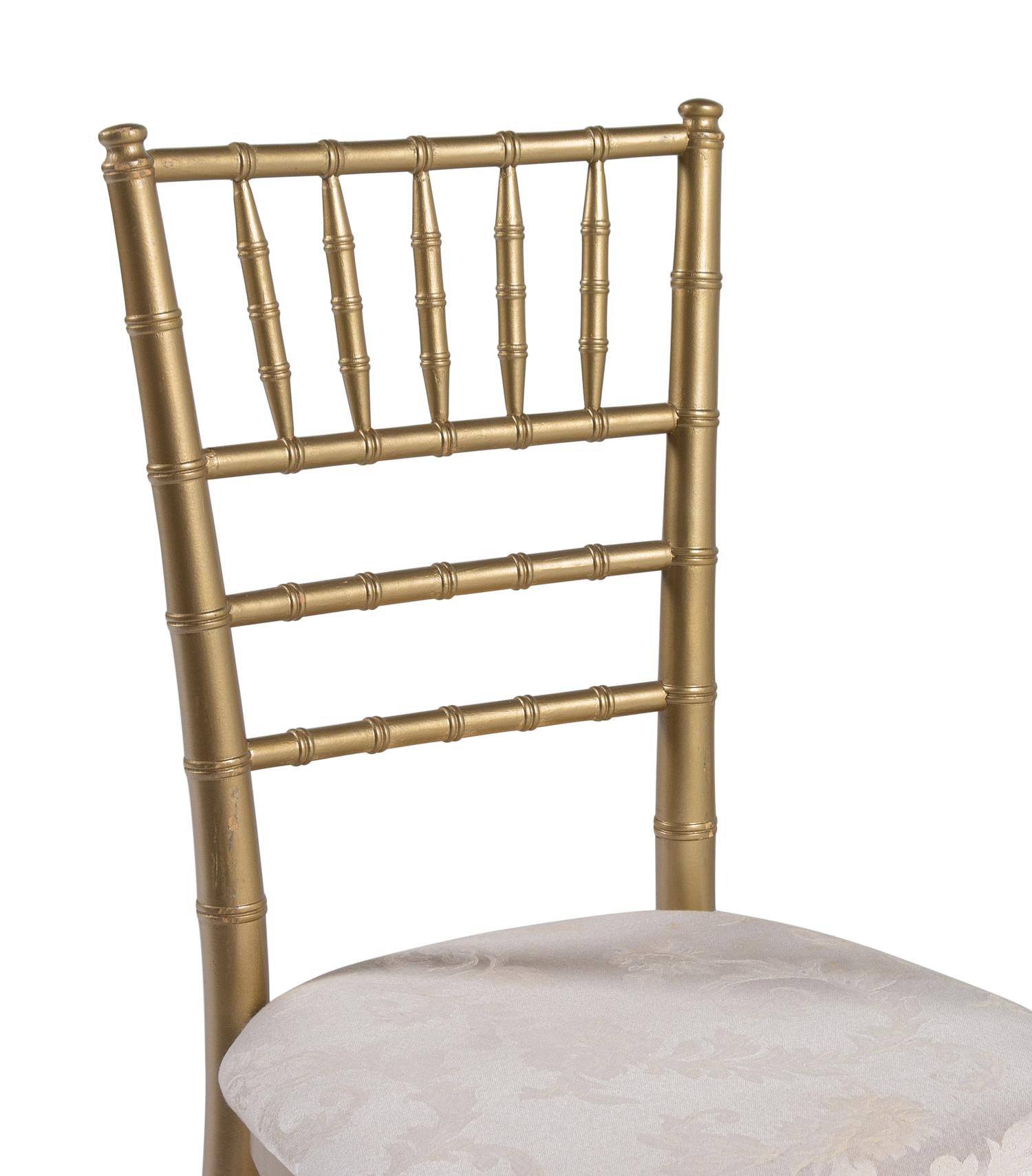 A Set of Twelve Gold-Painted Ballroom Chairs