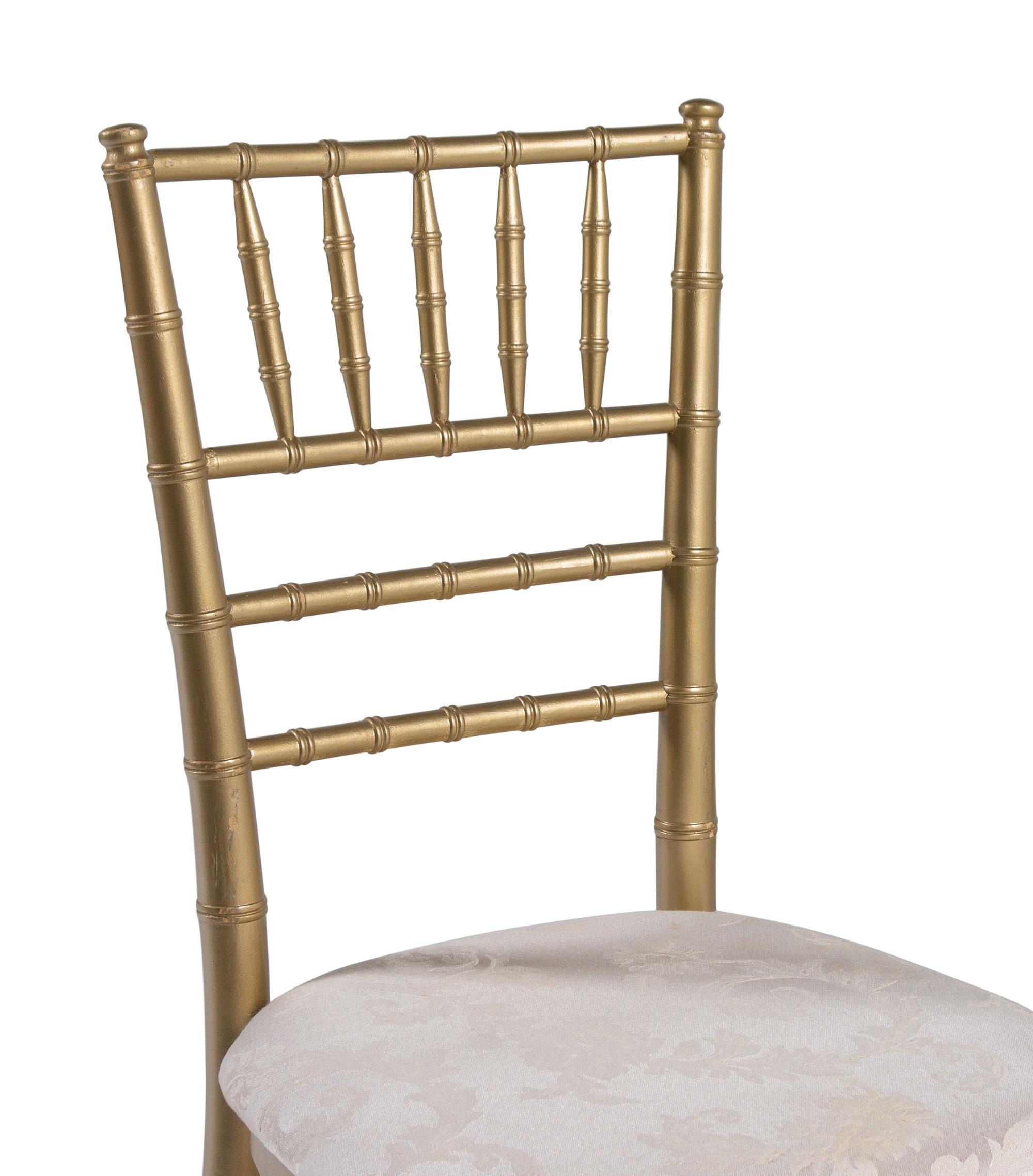 A Set of Twelve Gold-Painted Ballroom Chairs