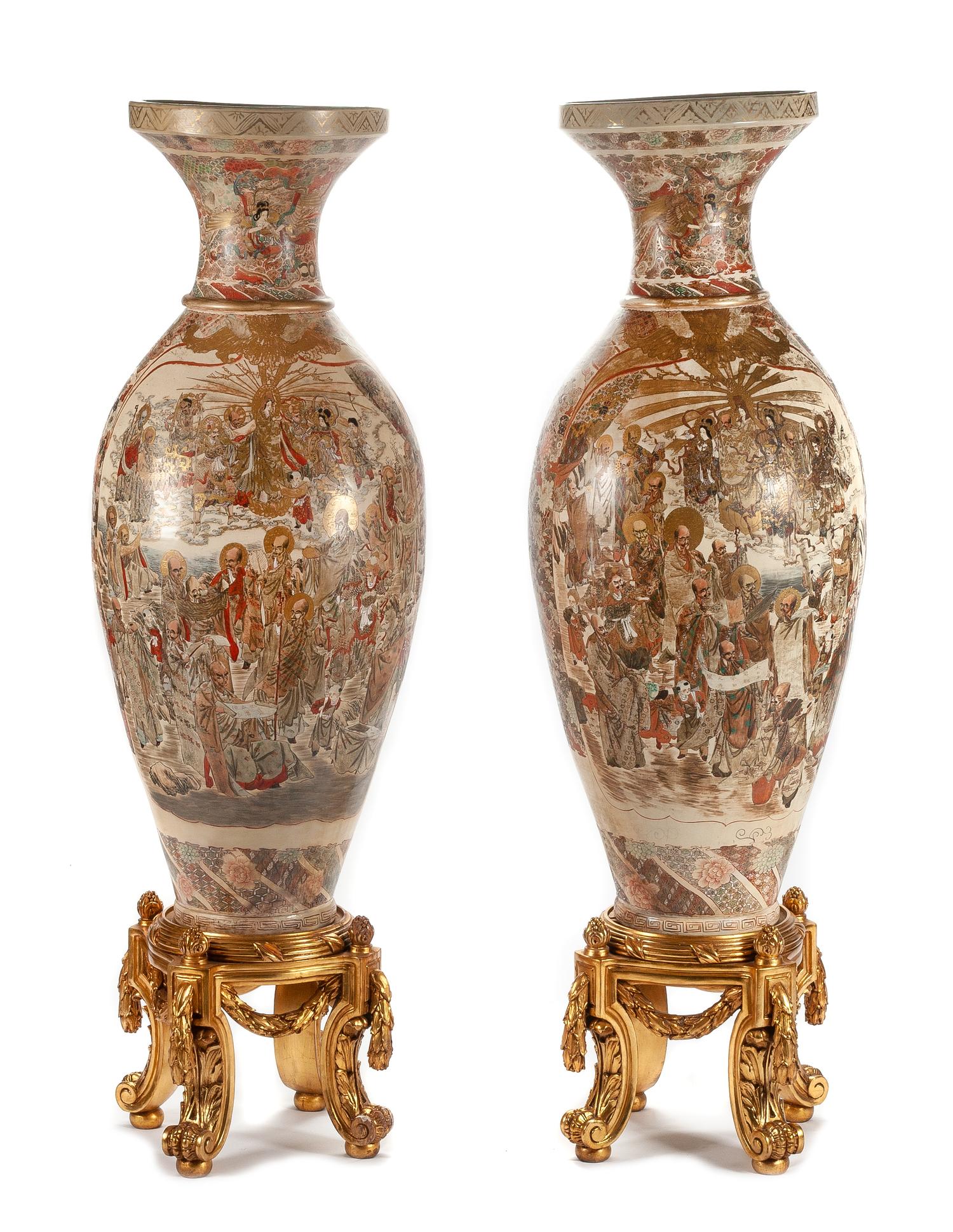 A Monumental Pair of Japanese Satsuma Porcelain Vases Height of vase 57 1/2 inches.
