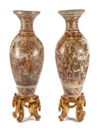 A Monumental Pair of Japanese Satsuma Porcelain Vases Height of vase 57 1/2 inches.