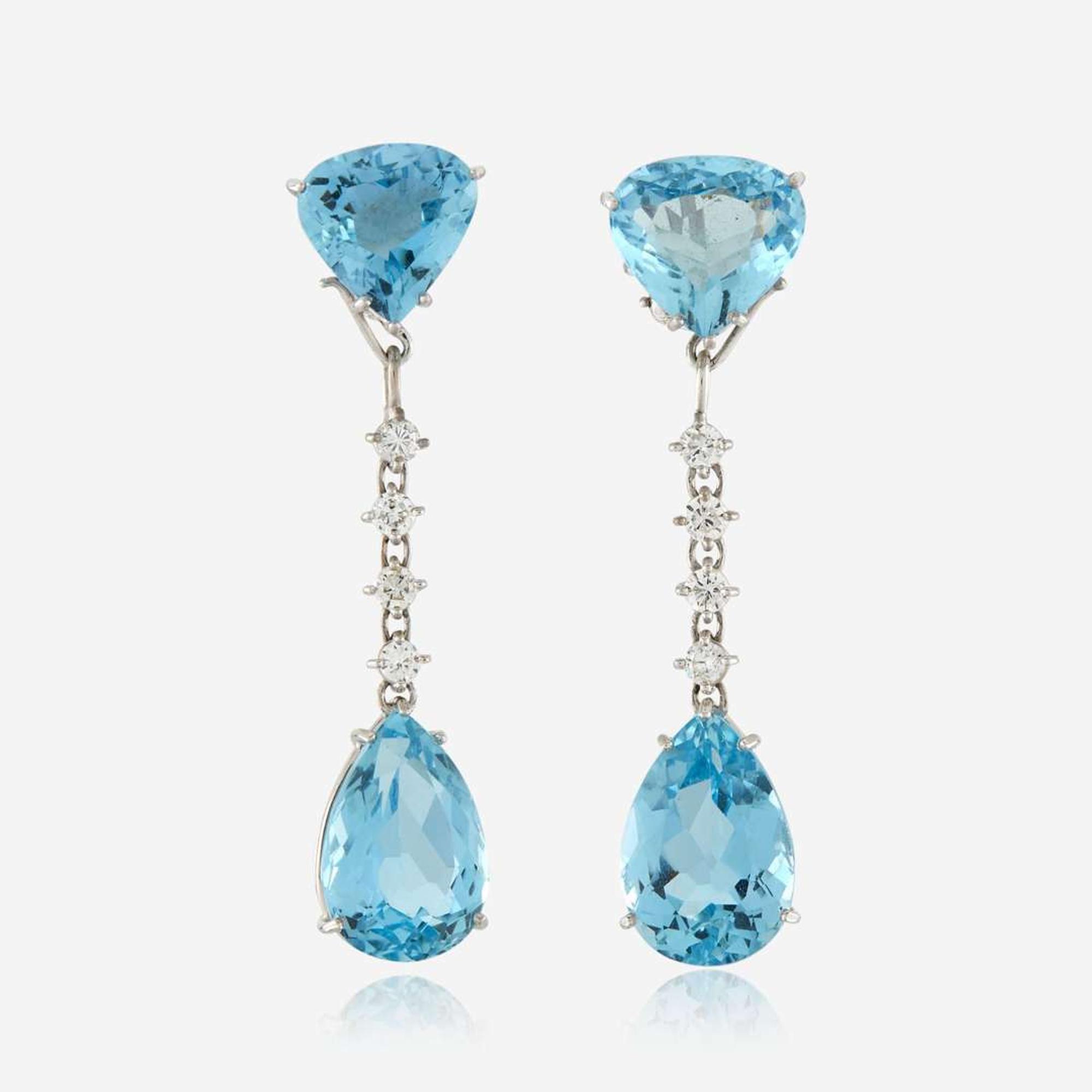 A pair of aquamarine, diamond, and white gold convertible earrings
