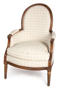 A Louis XVI Carved Walnut Bergere Height 37 inches. — LATE 18TH CENTURY