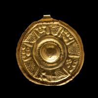A Near Eastern Gold Disk Pendant