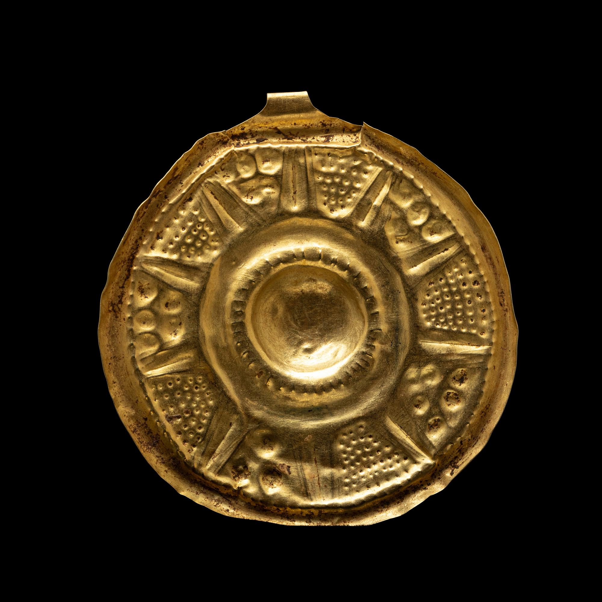 A Near Eastern Gold Disk Pendant