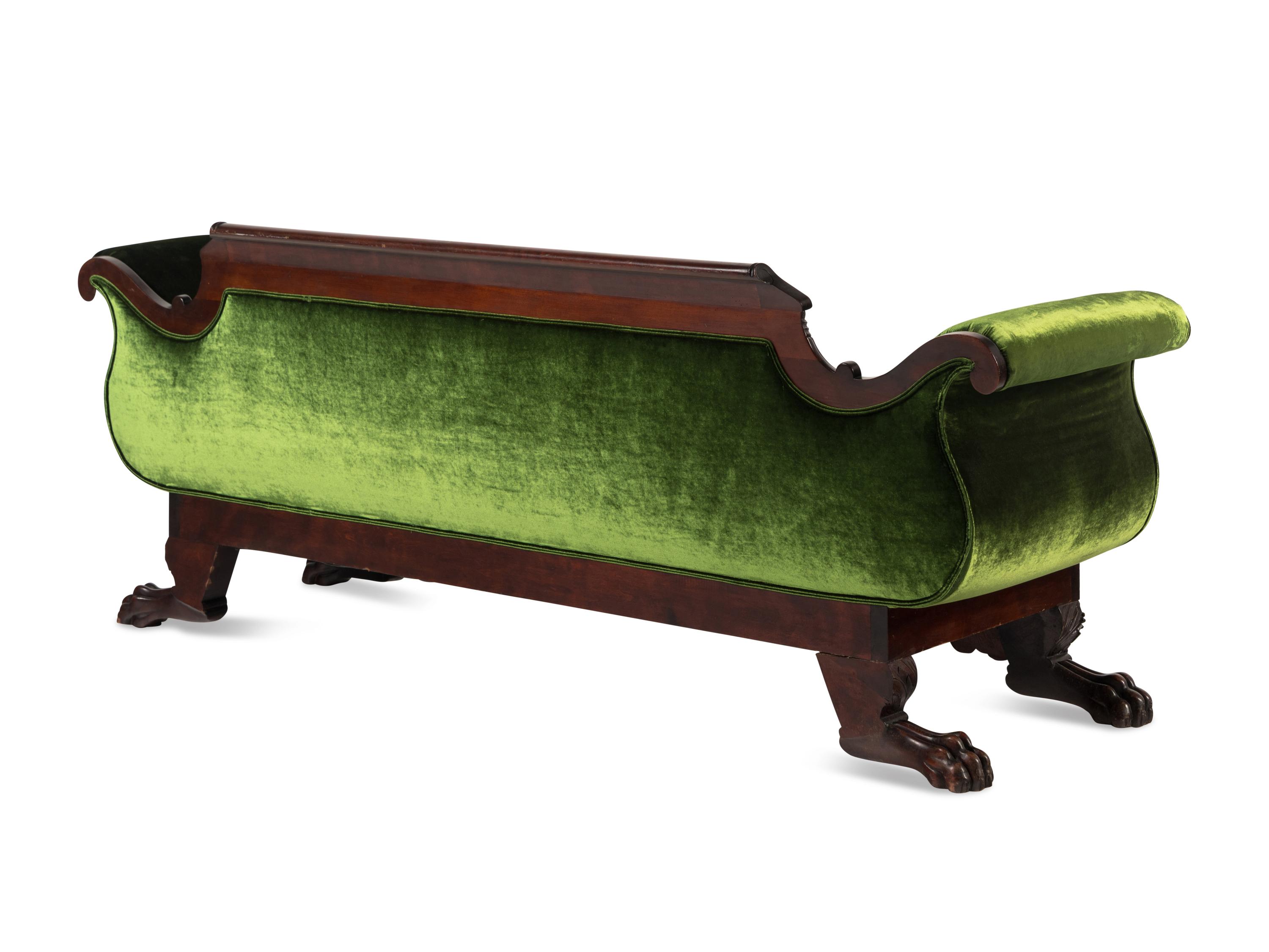 A Classical Carved Mahogany Sofa