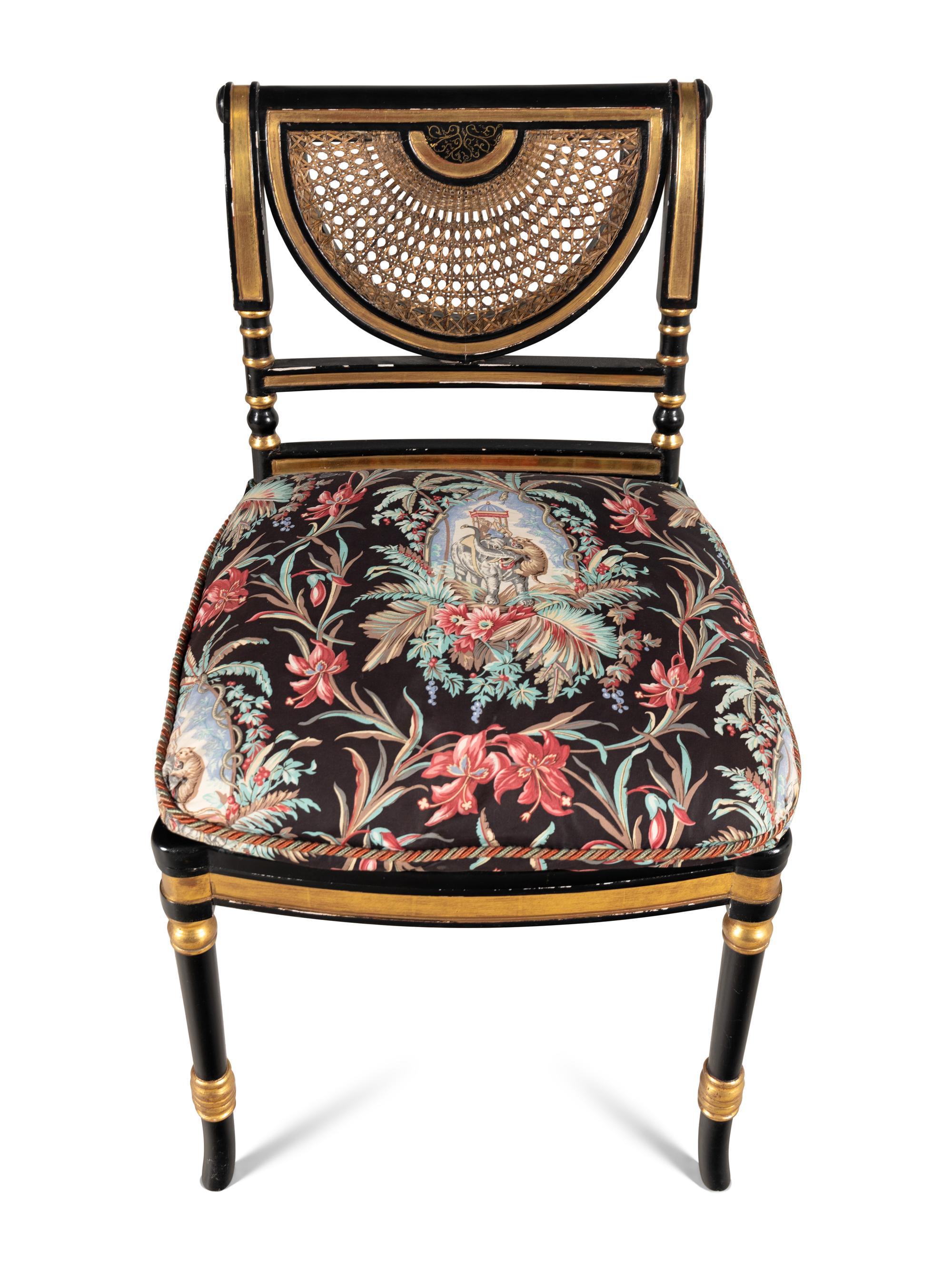 A Set of Ten Regency Style Black-Painted and Parcel Gilt Dining Chairs