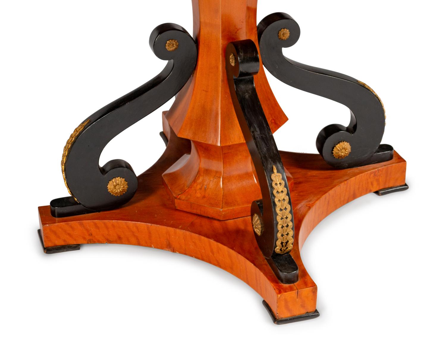 An Austrian Part Ebonized and Inlaid Ash and Walnut Center Table — 19TH CENTURY