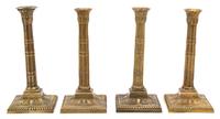 Four Mottahedeh Cast Brass Neoclassical Style Candlesticks Height 9 inches.