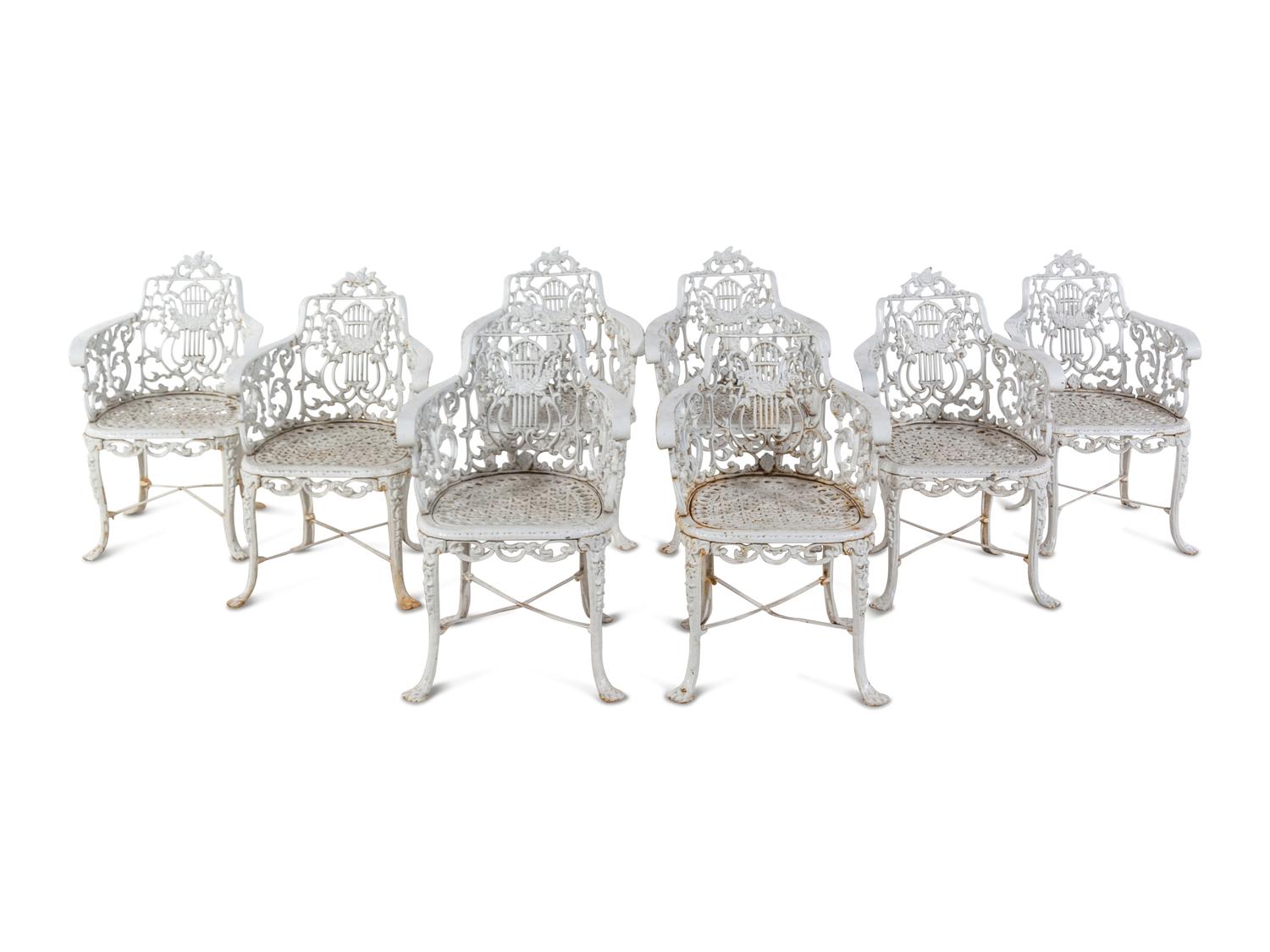 A Set of Eight Cast Metal Garden Armchairs