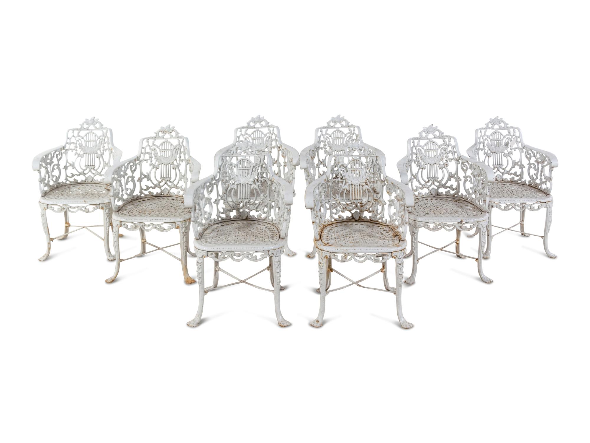 A Set of Eight Cast Metal Garden Armchairs