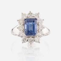 A sapphire, diamond, and white gold ring