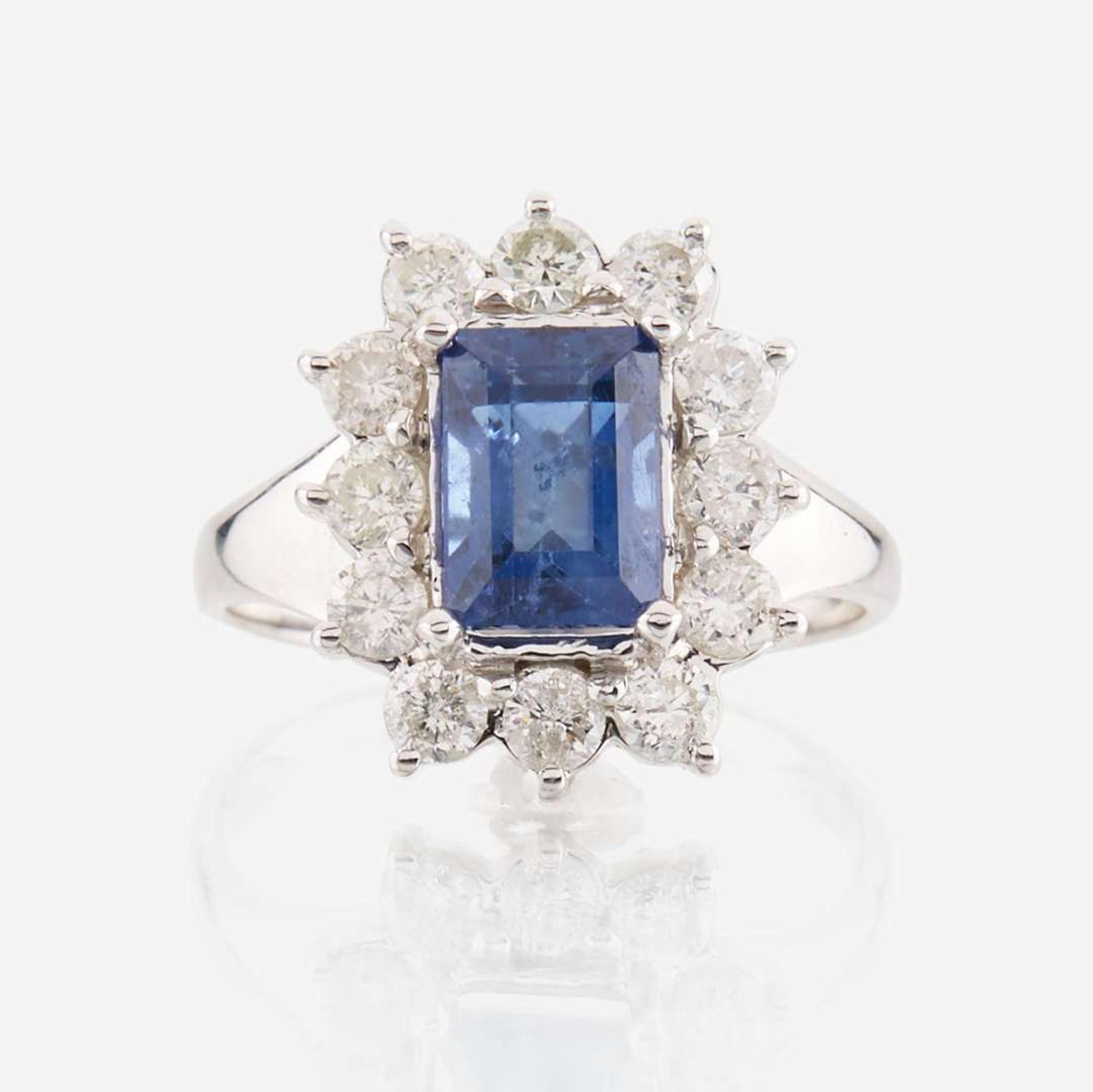 A sapphire, diamond, and white gold ring