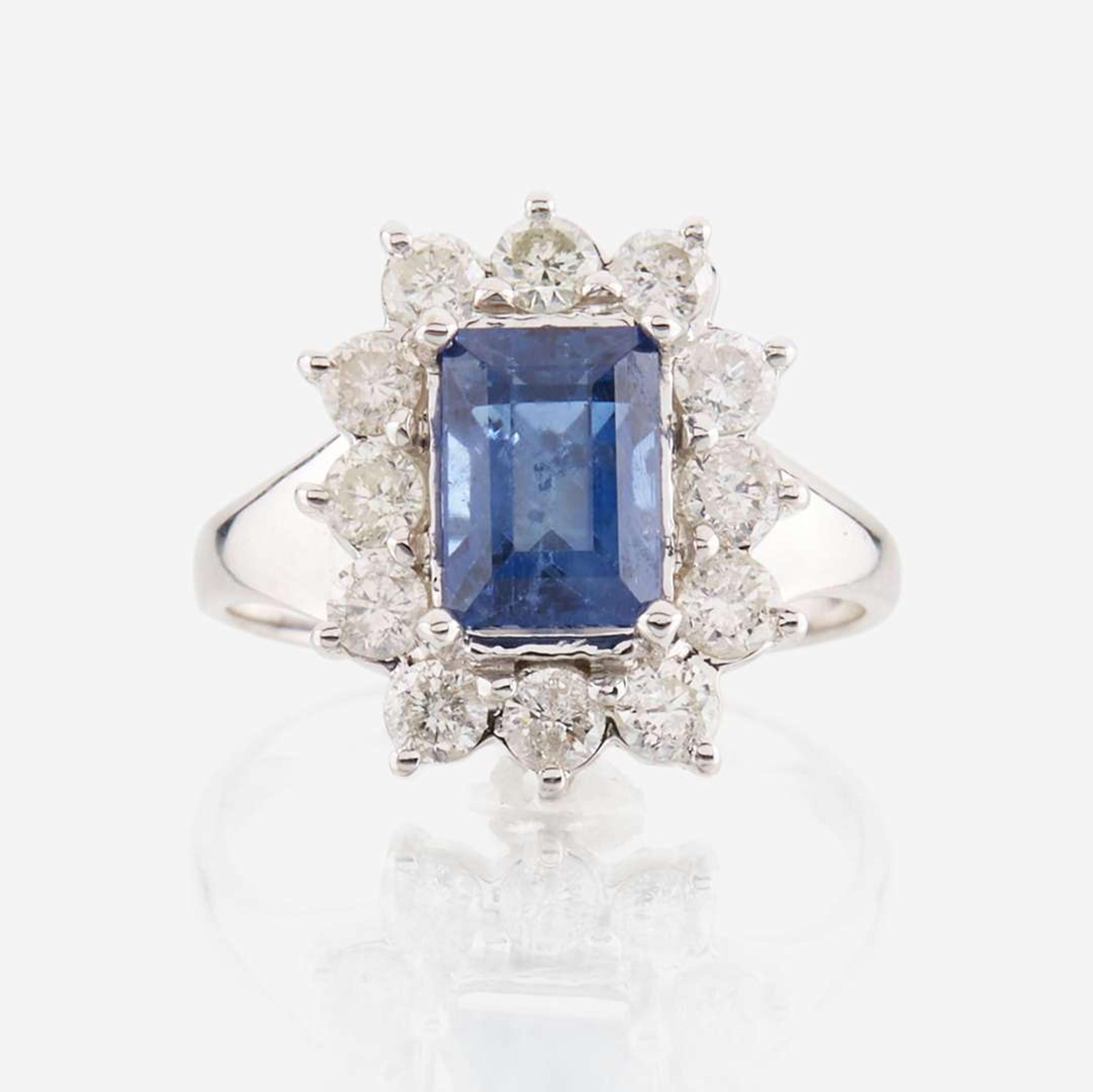 A sapphire, diamond, and white gold ring