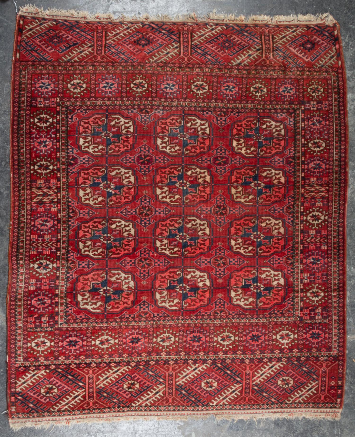 A Bokhara Wool Mat 4 feet 3 inches x 3 feet 8 inches. — FIRST HALF 20TH CENTURY