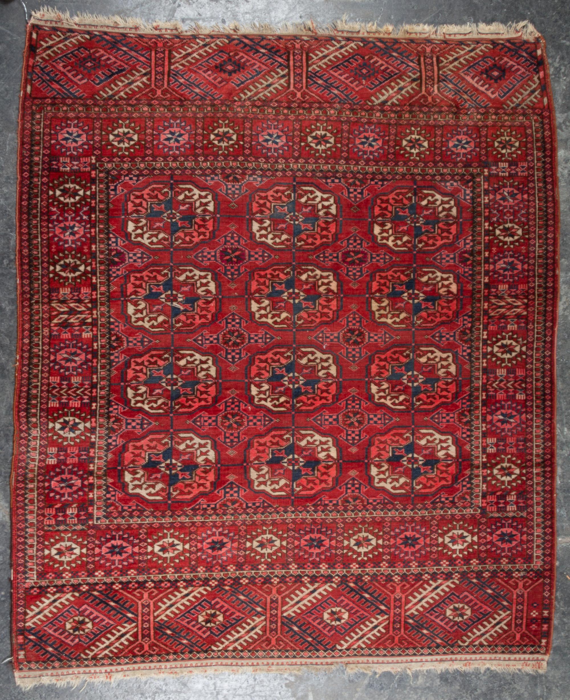 A Bokhara Wool Mat 4 feet 3 inches x 3 feet 8 inches. — FIRST HALF 20TH CENTURY
