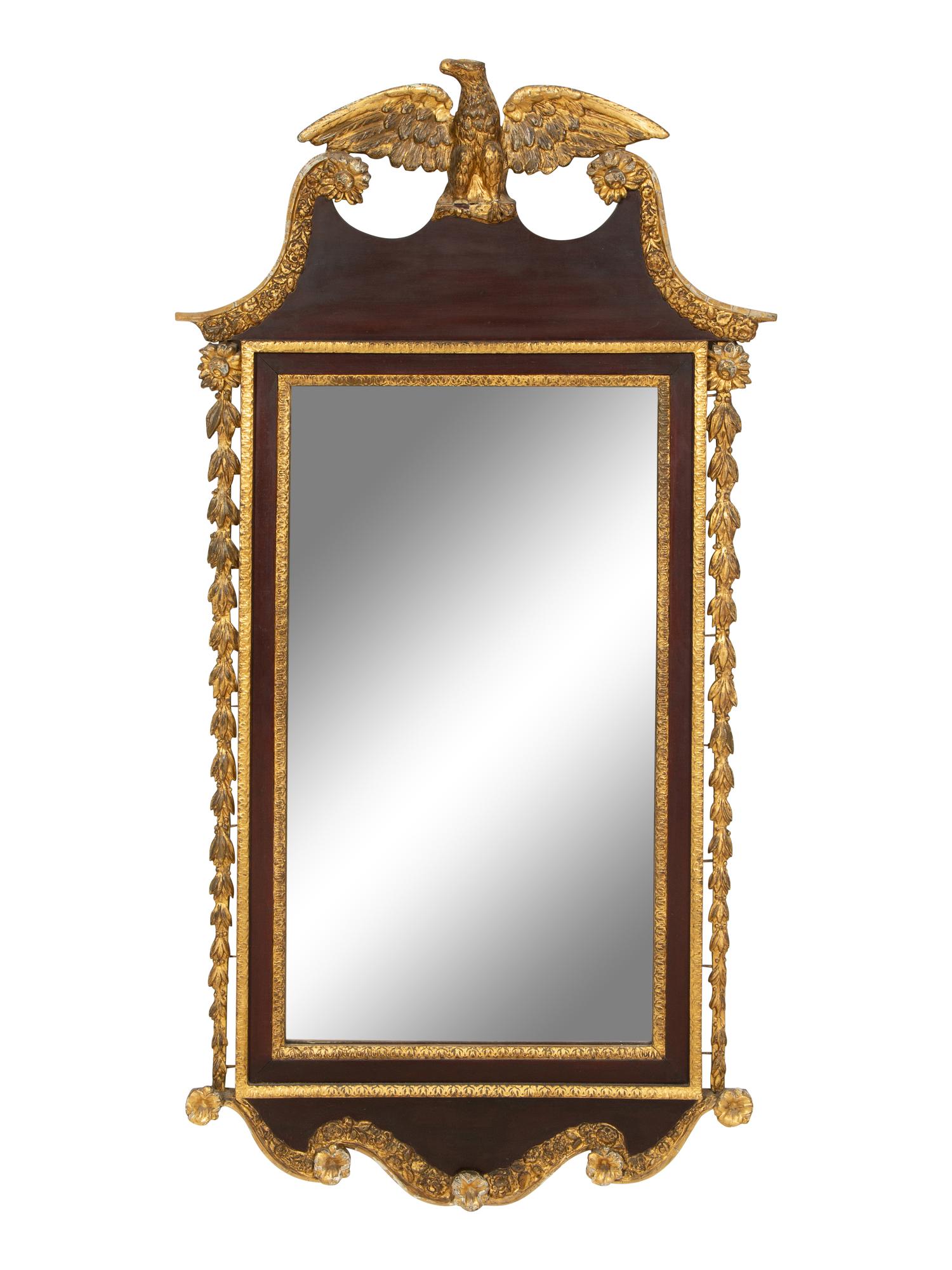 A George III Style Parcel Gilt Mahogany Mirror