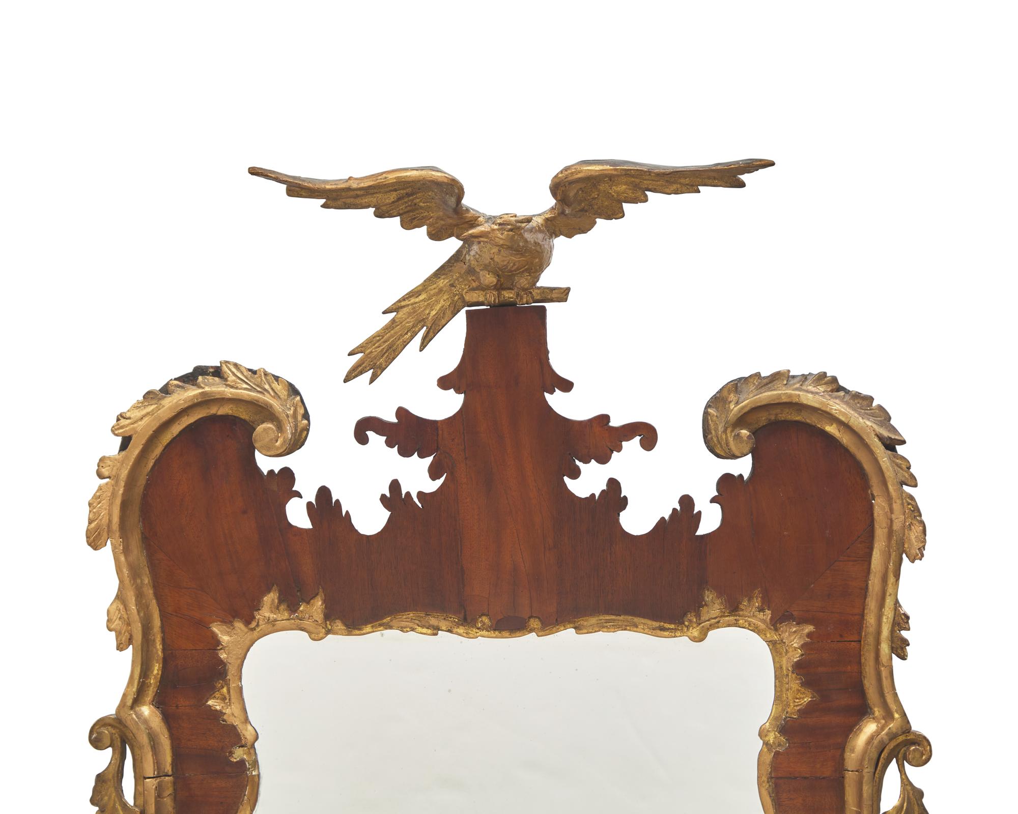 A George II Walnut Veneered and Parcel-Gilt Looking Glass