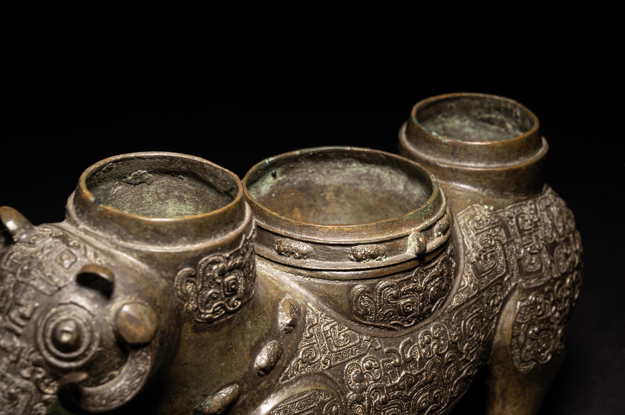 A Chinese Archaistic Style Bronze Bull-Form Wine Warmer
