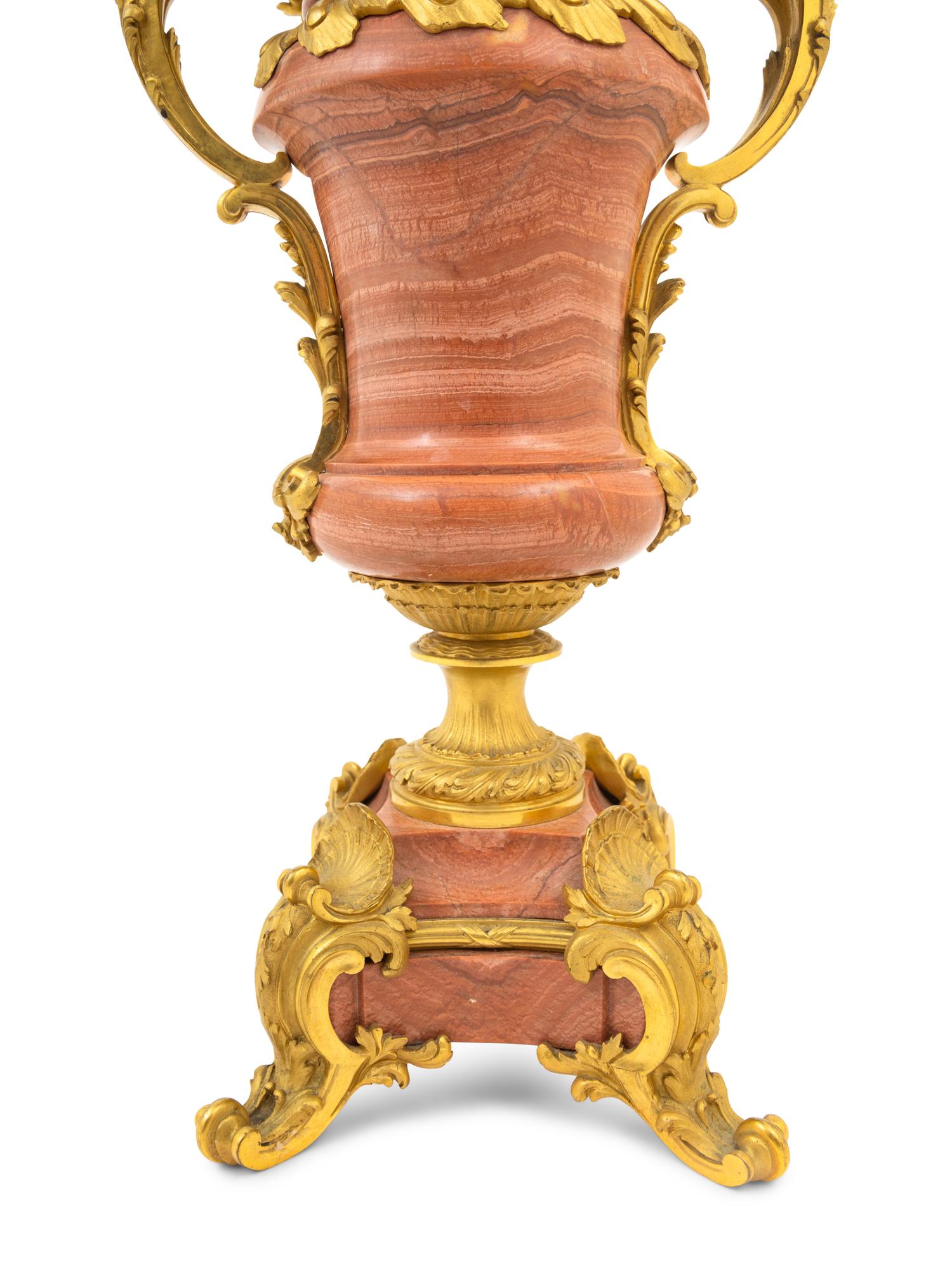A Pair of French Gilt Bronze Mounted Marble Four-Light Candelabra