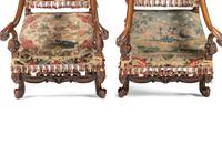 A Pair of William and Mary Style Walnut Armchairs with Flemish Tapestry Upholstery