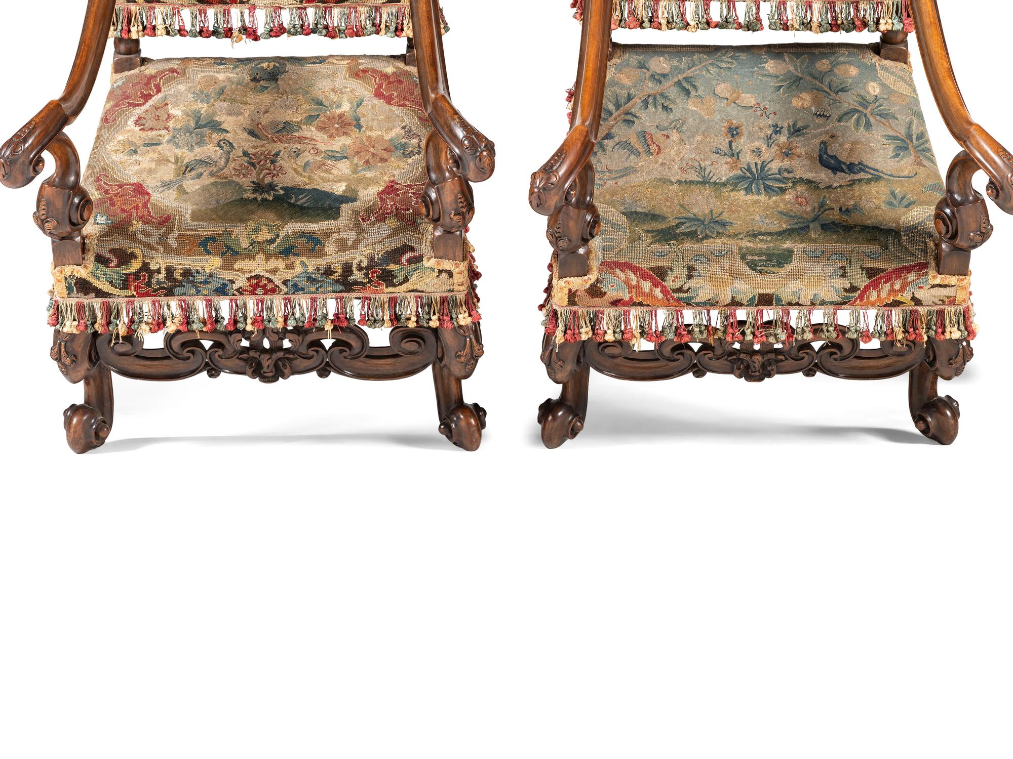 A Pair of William and Mary Style Walnut Armchairs with Flemish Tapestry Upholstery