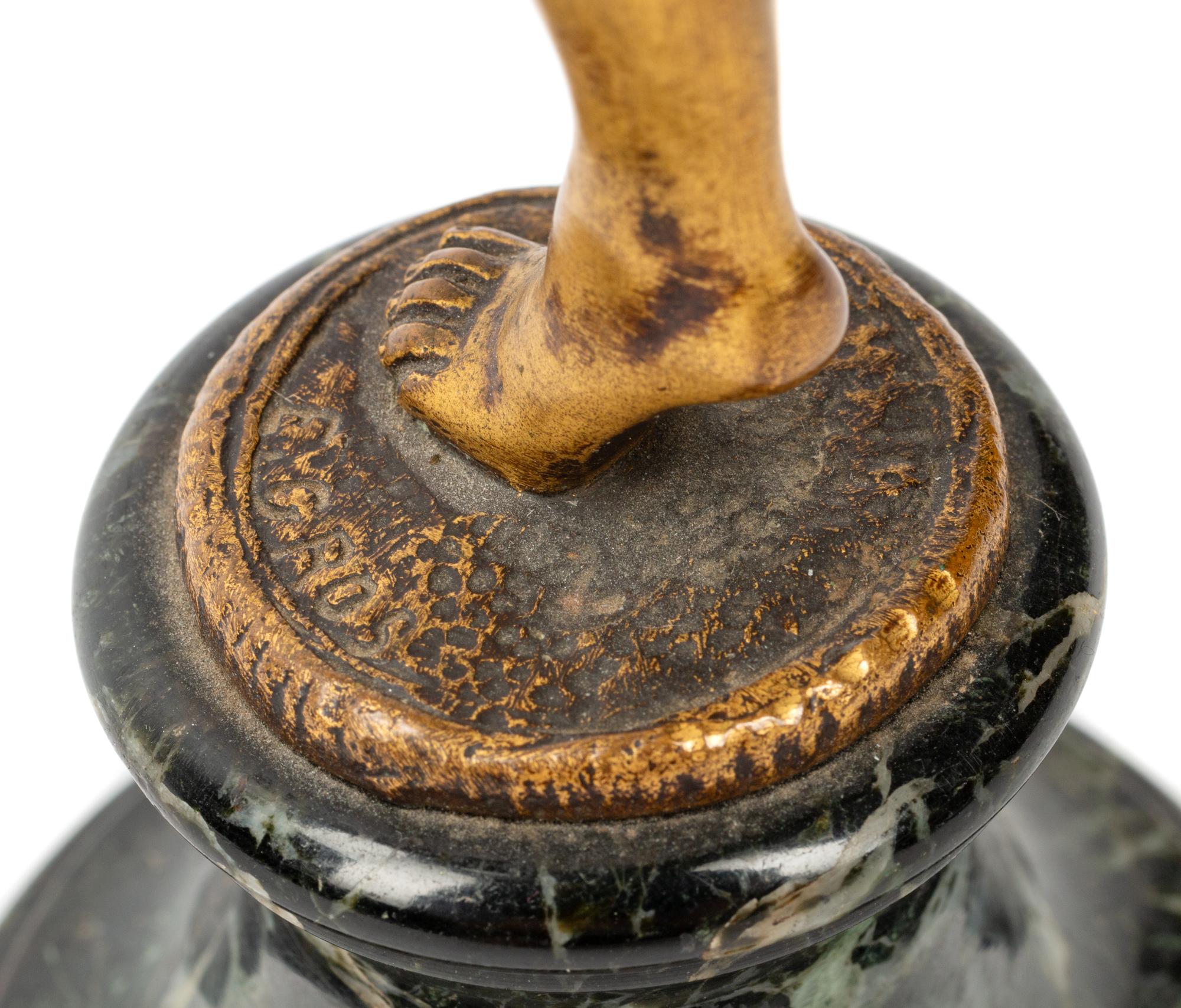 A French Gilt Bronze Figure on a Marble Base