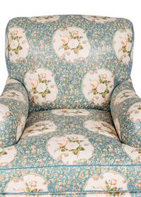 An English Chintz-Upholstered Easy Chair and Ottoman