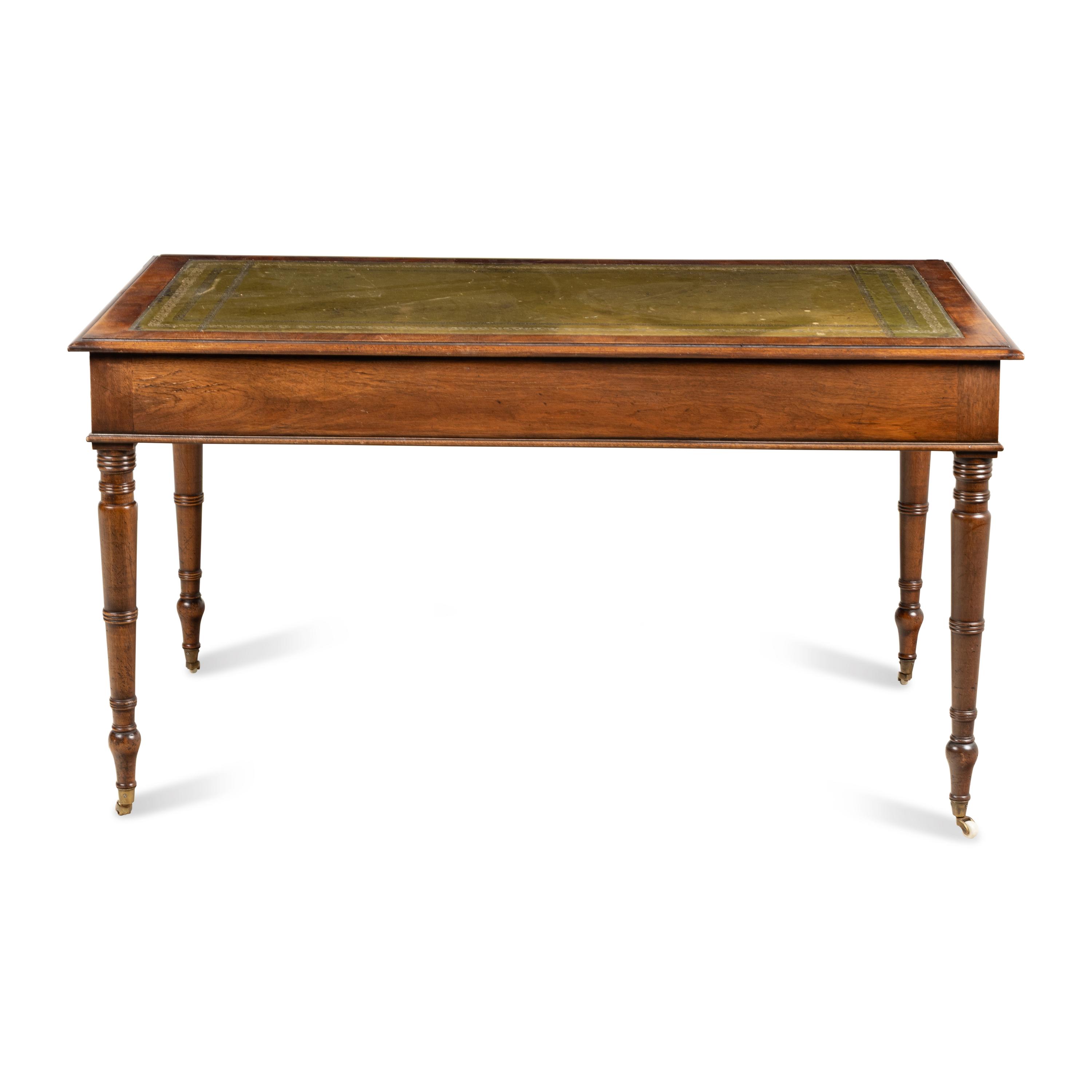A Regency Style Tooled-Leather Inset Mahogany Writing Desk