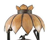 A Fairy Phonograph Patinated Metal Lamp with a Slag Glass Shade