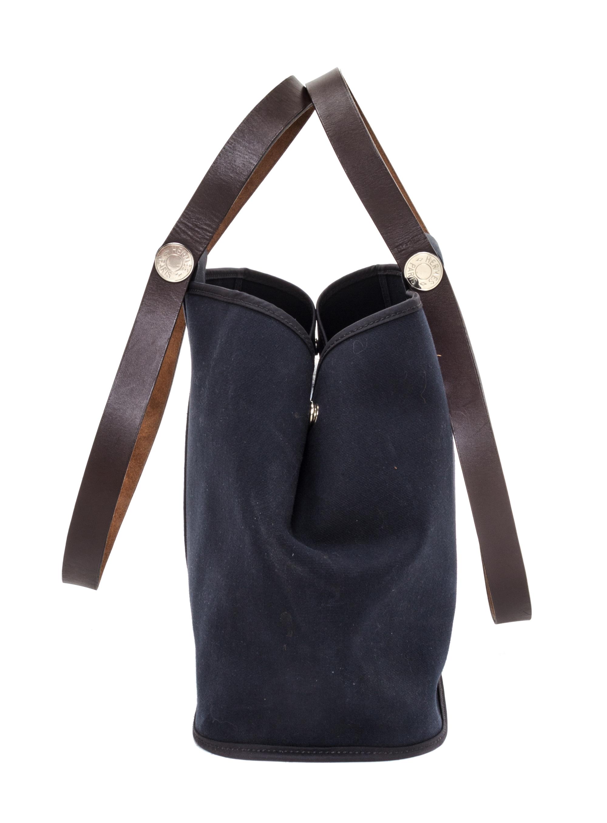 An Hermes Black Canvas Cabag Elan Tote, 10" x 14" x 5.5".