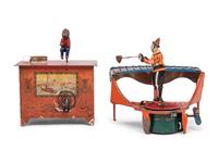 Two Musical Tin Lithograph Toys