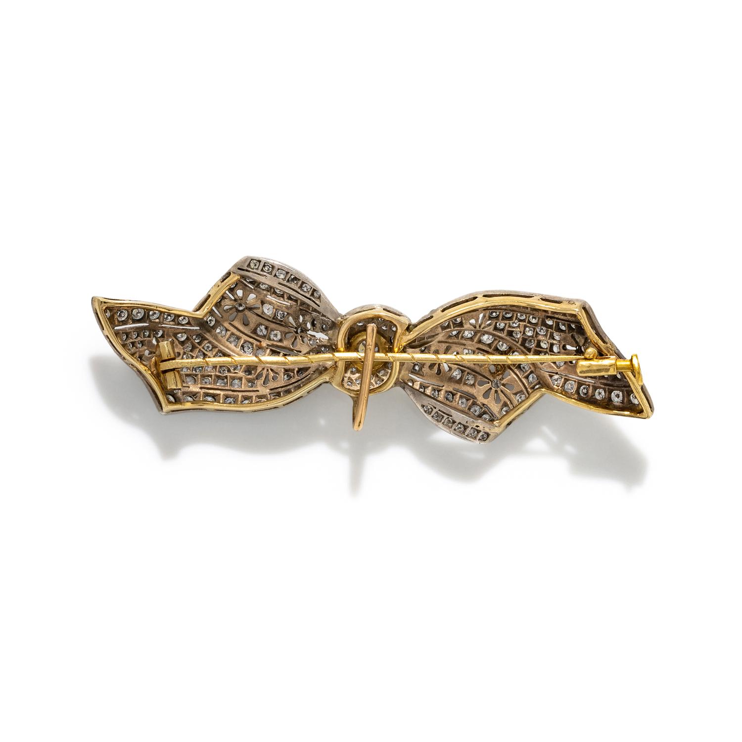 ANTIQUE, SILVER-TOPPED GOLD AND DIAMOND BOW BROOCH/PENDANT