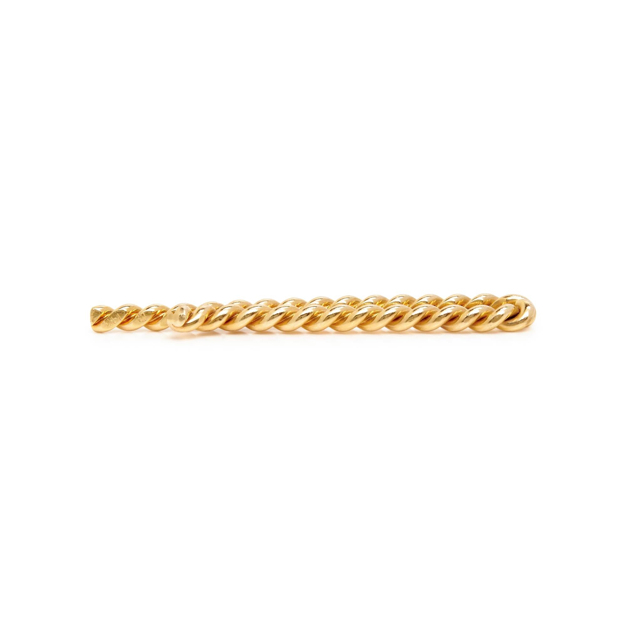 COLLECTION OF SIGNED YELLOW GOLD TIE BARS